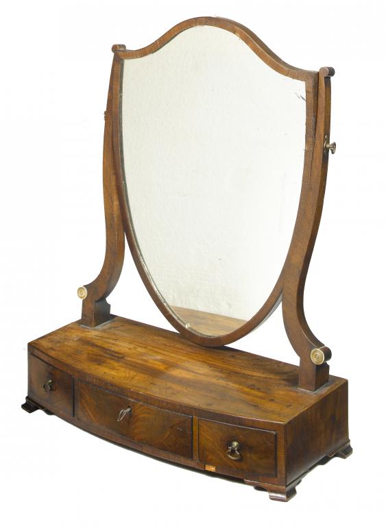 Appraisal: A GEORGE III MAHOGANY DRESSING MIRROR with shield shaped plate