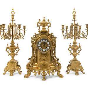 Appraisal: A Regence Style Gilt-Metal Three-Piece Clock Garniture Height of clock