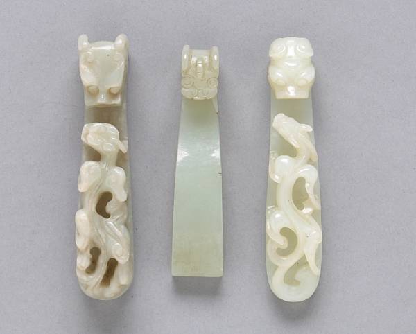 Appraisal: A group of three jade belt hooks The first featuring