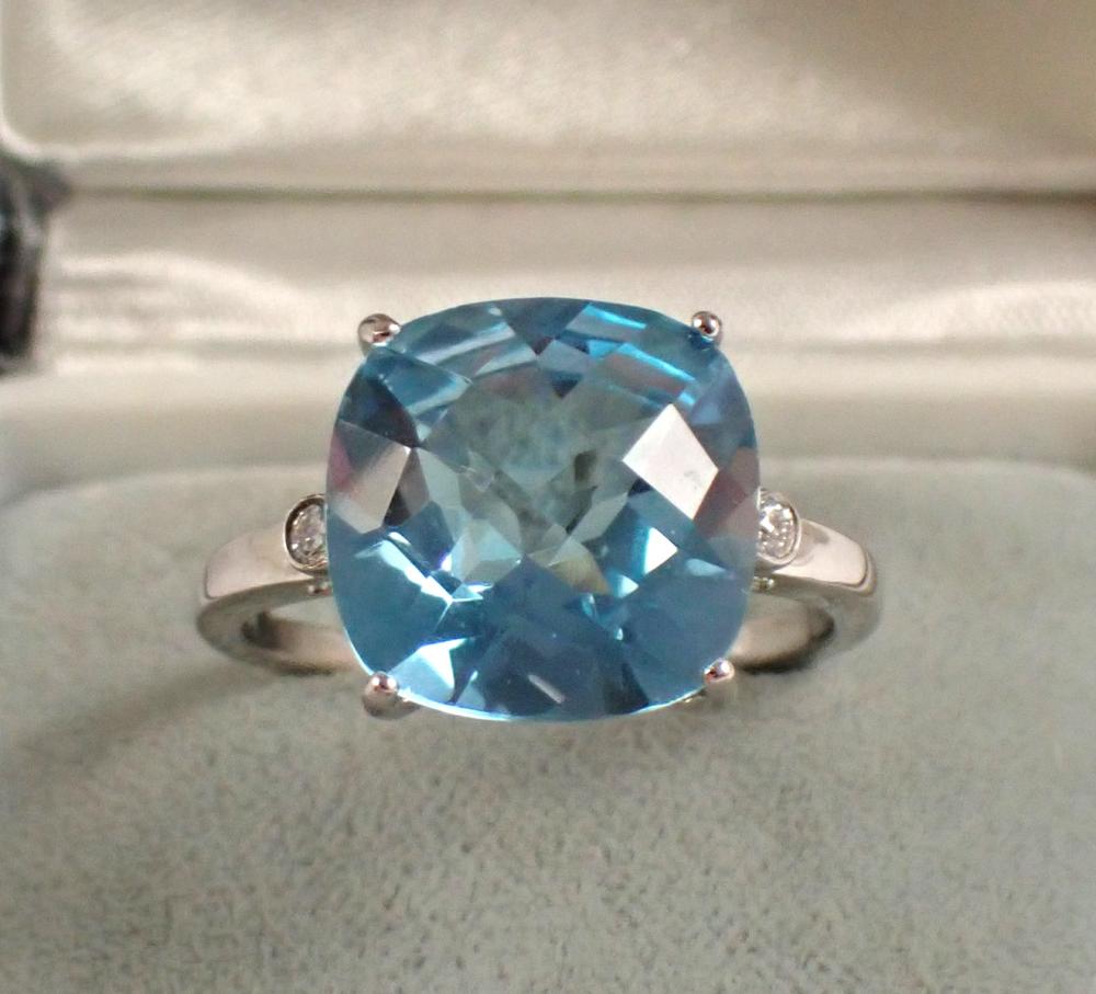 Appraisal: BLUE TOPAZ DIAMOND AND FOURTEEN KARAT GOLD RING The k