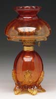 Appraisal: RARE AMBERINA MINI LAMP S - Optic paneled amberina glass