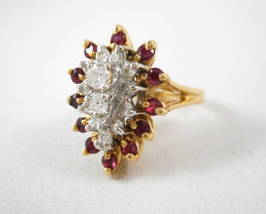 Appraisal: RUBY DIAMOND AND FOURTEEN KARAT GOLD RING with twelve round-cut