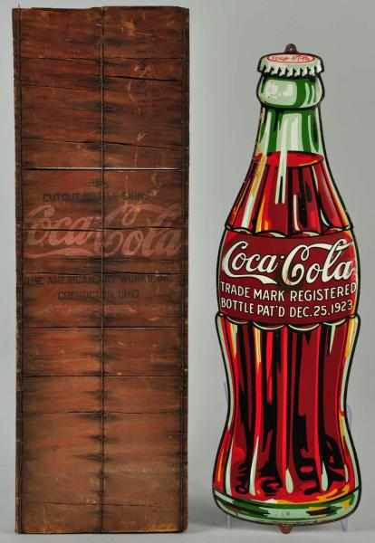 Appraisal: Embossed Tin s Coca-Cola Die-Cut Bottle Sign Description Complete with