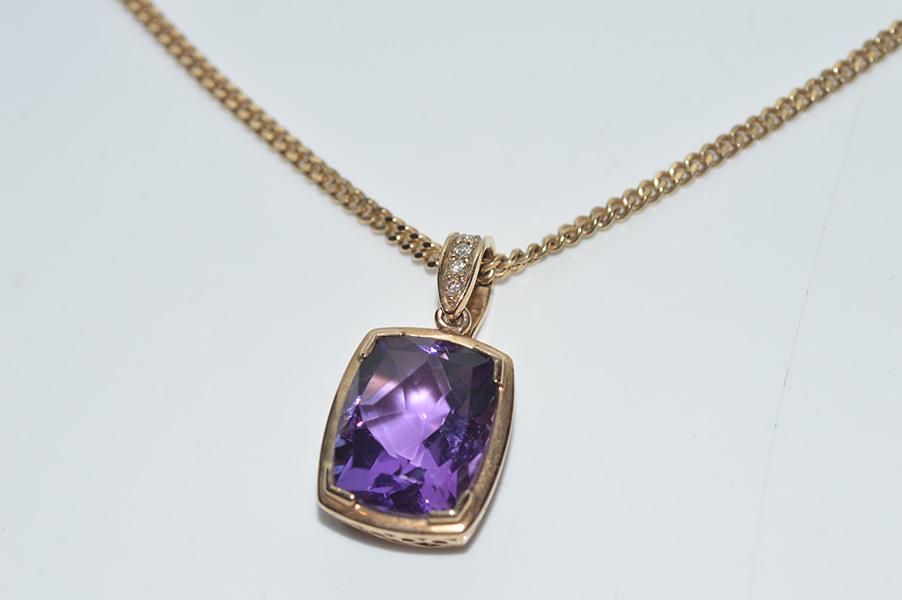 Appraisal: AN AMETHYST AND DIAMOND PENDANT ENHANCER TO FLAT CURBLINK CHAIN