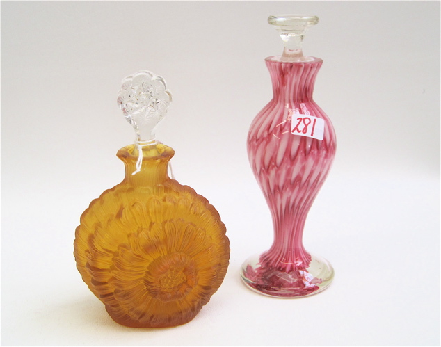 Appraisal: TWO ART GLASS PERFUME BOTTLES a signed Ingrid Czech amber