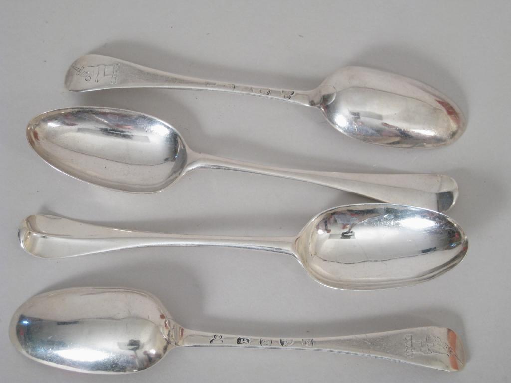 Appraisal: Three George II bottom marked Table Spoons Hanoverian pattern engraved