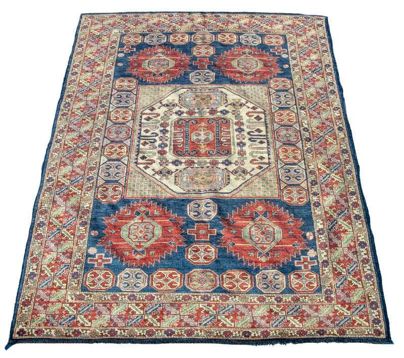 Appraisal: KARACHOPH KAZAK STYLE CARPET Northwest Pakistan Large ivory octagonal medallion