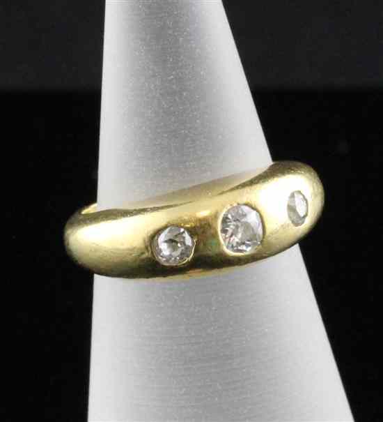 Appraisal: A French ct gold gypsy set three stone diamond ring