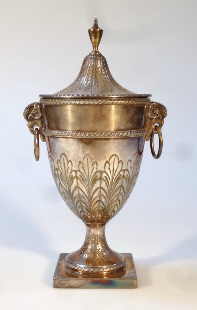 Appraisal: An Edwardian silver plated vase the campana body headed by