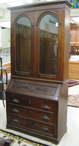 Appraisal: A VICTORIAN WALNUT SECRETARY BOOKCASE American th century The top