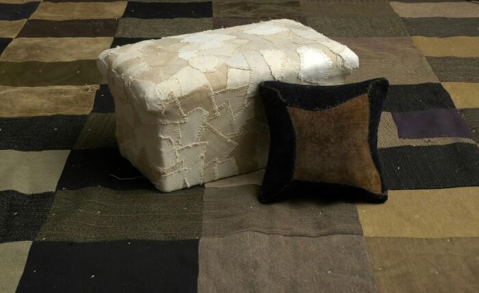 Appraisal: American Wool and Cotton Quilt Together with a patchwork footstool