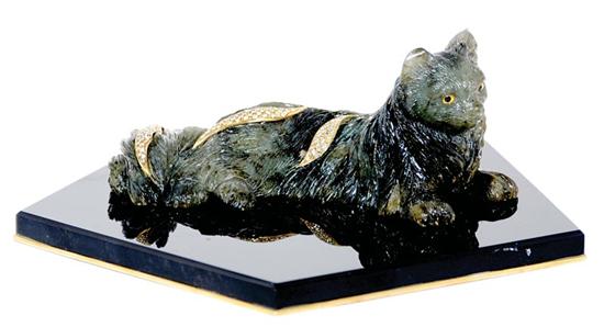 Appraisal: Diamond-set carved stone cat sculpture intricately carved stone recumbent feline