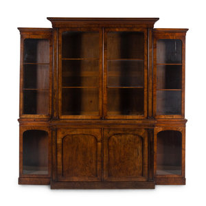 Appraisal: An English Walnut Breakfront Bookcase th Century Height x width