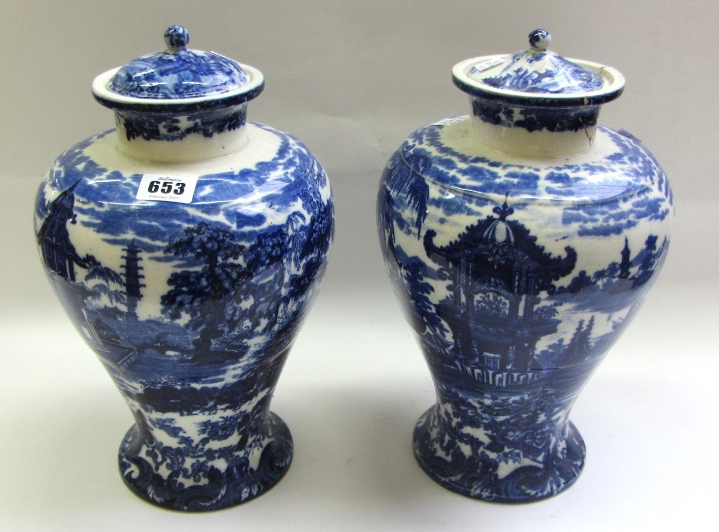 Appraisal: A pair of Wedgwood blue and white earthenware baluster vases