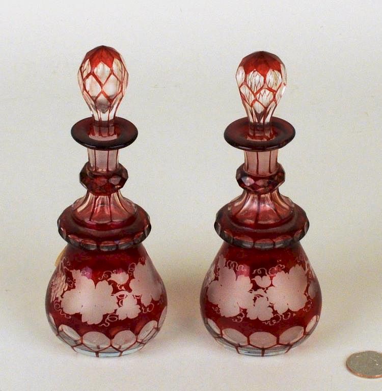 Appraisal: Pair Cranberry Cut To Clear Cologne Bottles Pair cranberry cut