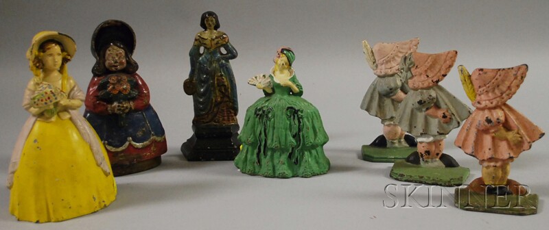 Appraisal: Seven Painted Cast Iron Figural Doorstops three Sunbonnet Babies a