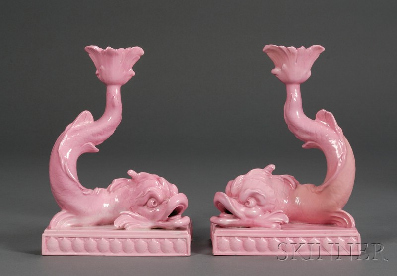 Appraisal: Pair of Wedgwood Pink Glazed Dolphin Candlesticks England c each