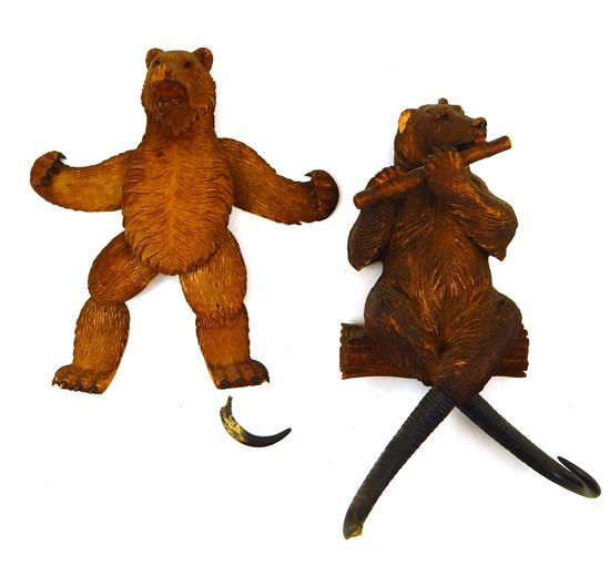 Appraisal: Two th C Black Forest carvings including bear puppet figure