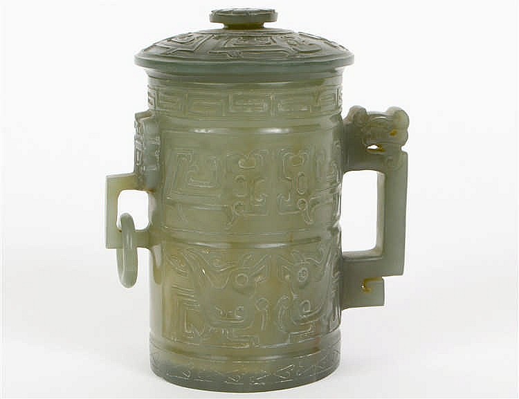 Appraisal: CHINESE ARCHAIC STYLE PALE GREEN JADE COVERED CUPThe cylindrical vessel