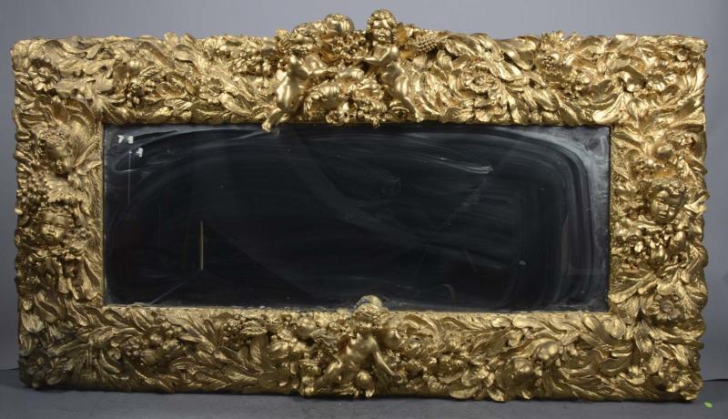 Appraisal: Finesse Originals Gilded Cherub Mirror This fancy rectangular wall mount