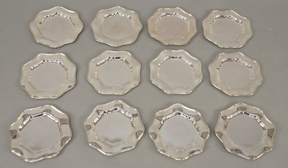 Appraisal: Set of twelve Gorham sterling bread plates having scallop rim