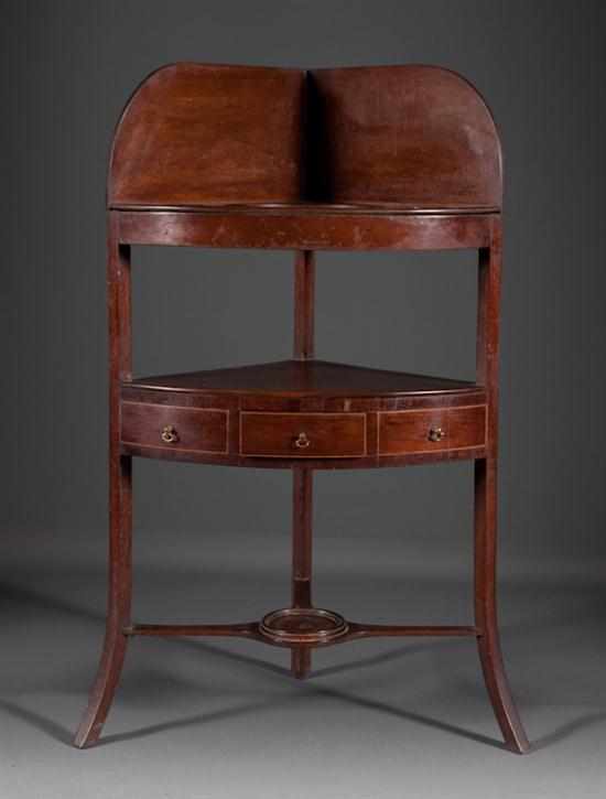 Appraisal: George III mahogany corner washstand circa with cut outs for