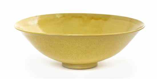 Appraisal: A Chinese Yellow Glazed and Carved Porcelain Bowl of slight