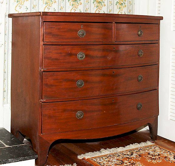 Appraisal: Bow Front Chest An English bow front mahogany chest early