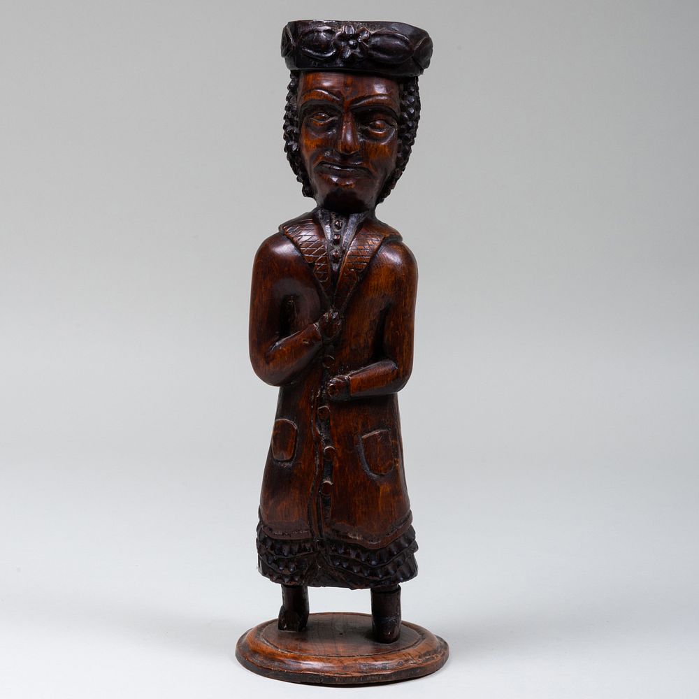 Appraisal: Flemish Carved Wood Tobbaconist Figure x in diam Condition Wear