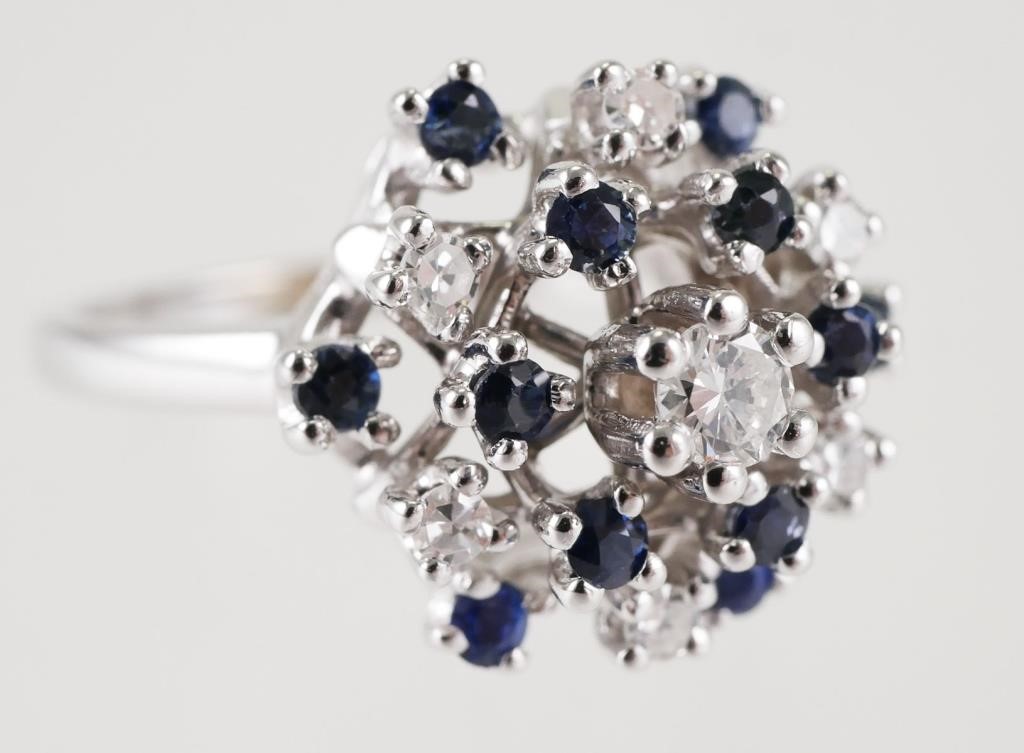 Appraisal: K white gold cluster ring with carat weight in diamonds