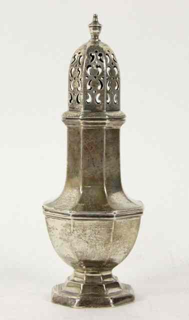 Appraisal: A silver caster Walker Hall Sheffield of octagonal baluster form