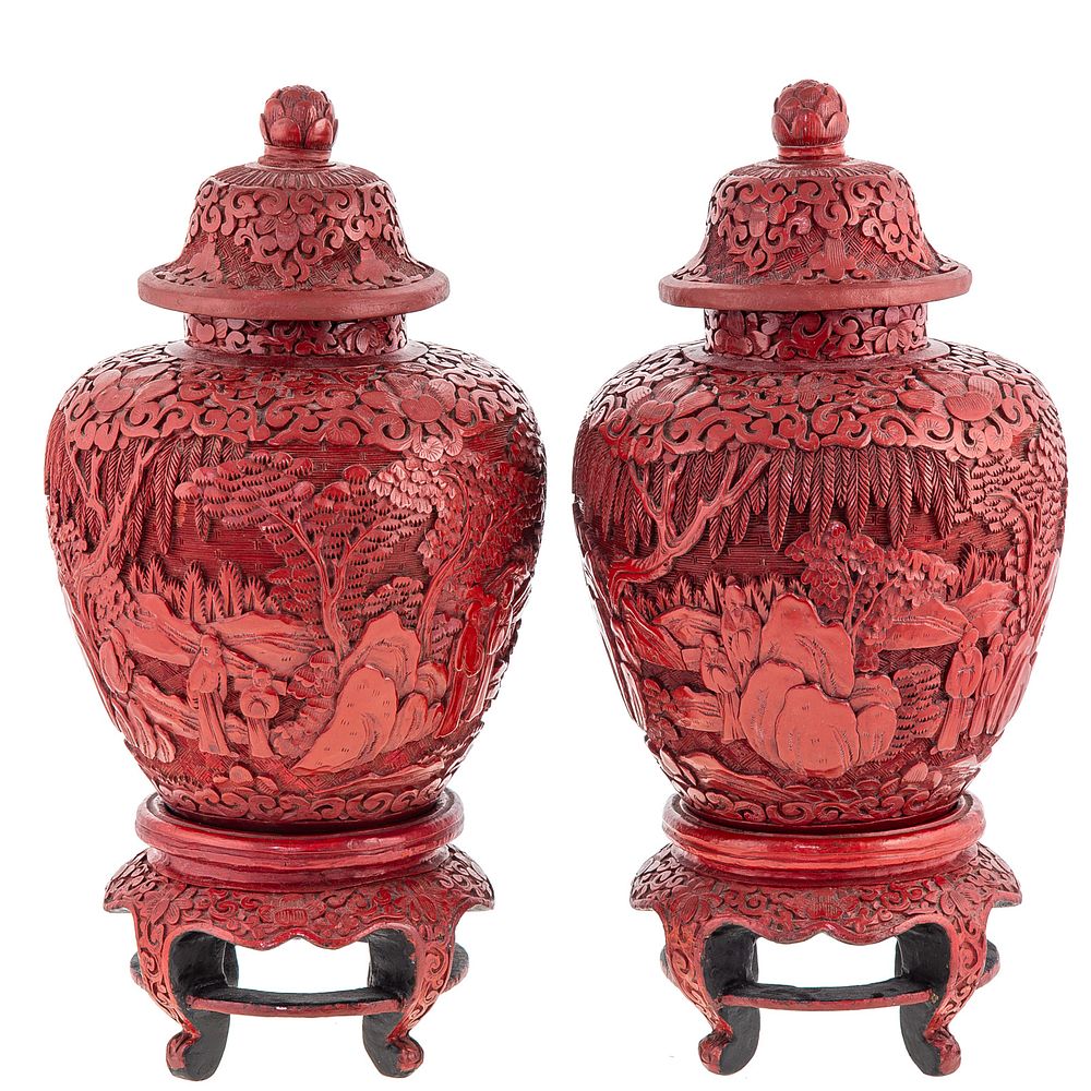 Appraisal: Pair of Chinese Cinnabar Lacquer Jars Stands Elaborately carved scenes