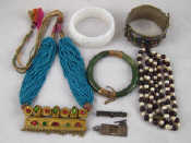 Appraisal: A mixed lot comprising three bangles two necklaces a brooch