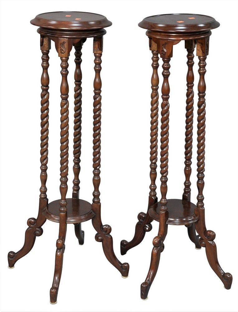 Appraisal: Pair of Mahogany Fern Stands having round top over four