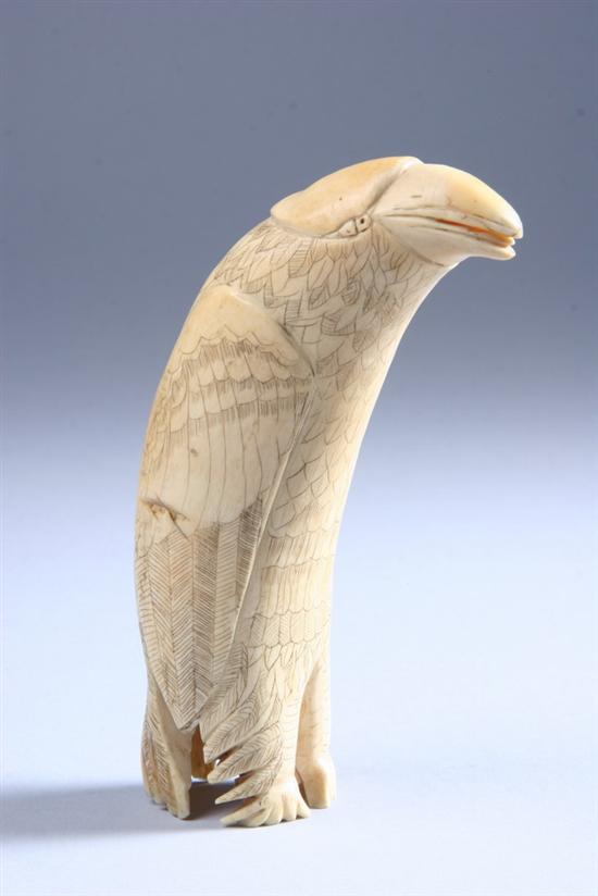 Appraisal: WHALE'S TOOTH CARVED AS EAGLE With scrimshaw feathers and other