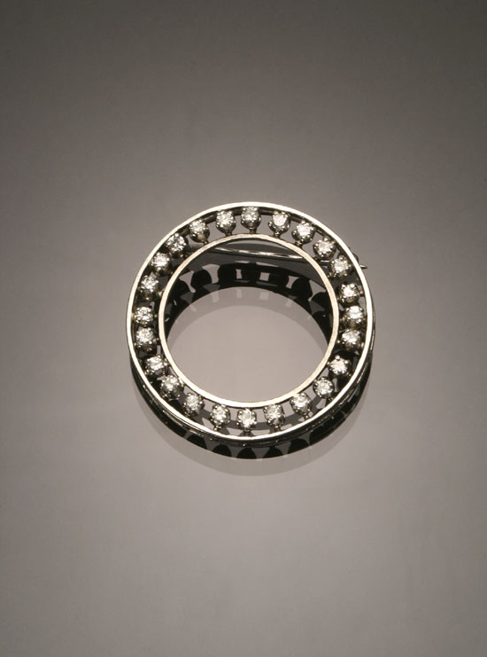 Appraisal: Art Deco Platinum and Diamond Circular Brooch Circa Set with