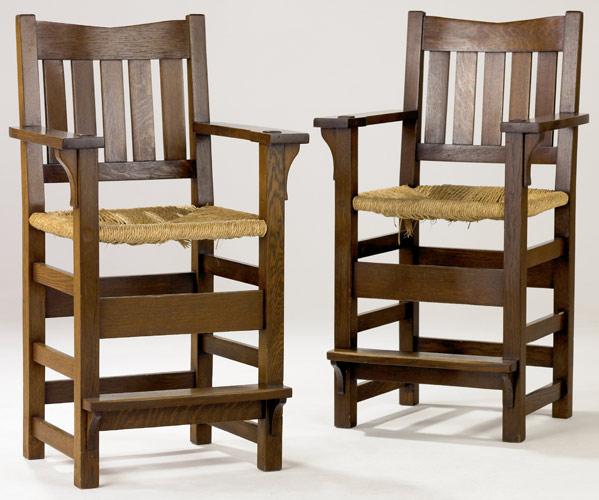 Appraisal: GUSTAV STICKLEY Pair of billiard chairs with rush seats Restored