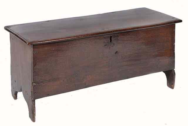 Appraisal: A TH CENTURY ELM PLANK COFFER with hinged rising lid