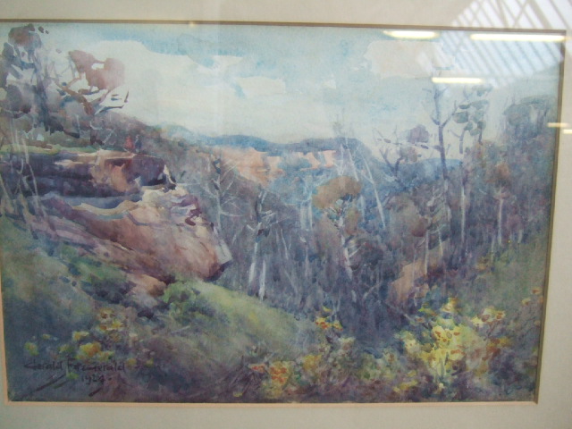 Appraisal: Gerald Fitzgerald - Rocky wooded landscape watercolour signed and dated