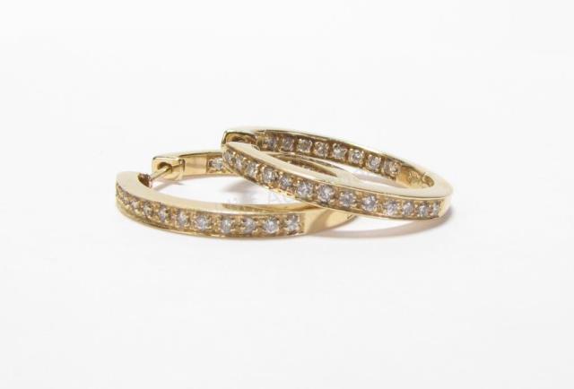 Appraisal: A pair of K yellow gold inside out diamond hoop