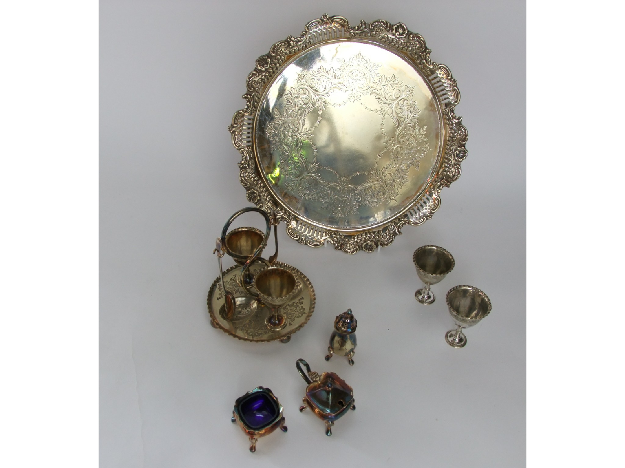 Appraisal: A silver plated Salver egg cruet and condiments