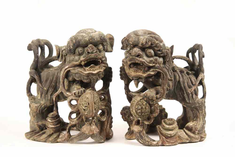 Appraisal: PAIR CARVED WOODEN FOO DOGS - th c Chinese Carved