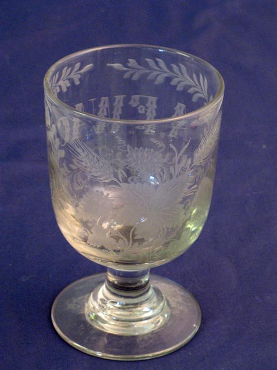 Appraisal: th century engraved clear glass rummer decorated with flowers and