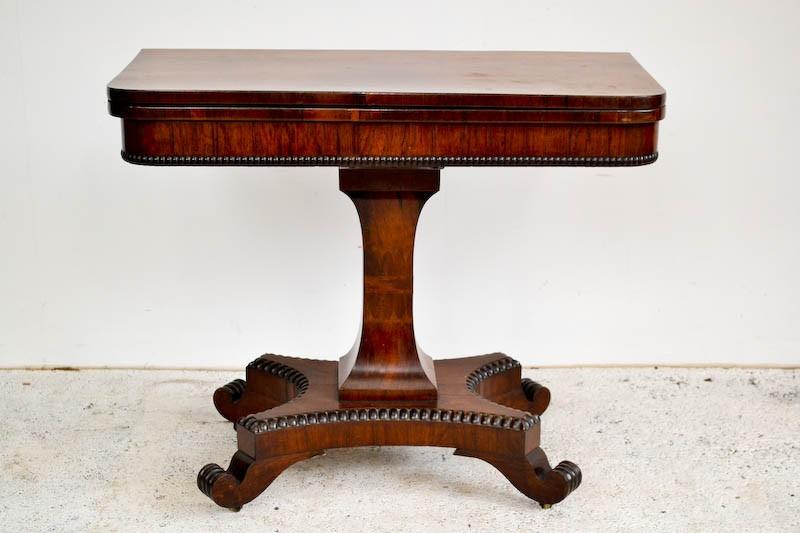 Appraisal: A WILLIAM IV ROSEWOOD GAMES TABLE ON PLATFORM BASE A