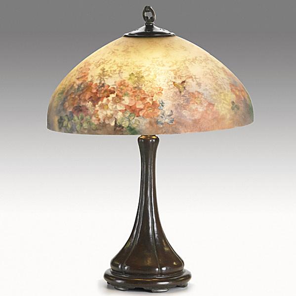 Appraisal: HANDELBronze table lamp with reverse-painted floral shadeShade stamped HANDEL PAT