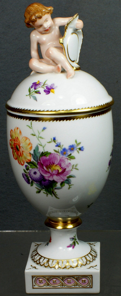 Appraisal: Royal Copenhagen covered jar with cherub finial hand painted floral