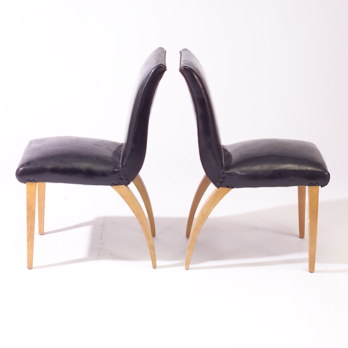 Appraisal: Pair of modern chairs upholstered in black vinyl and raised