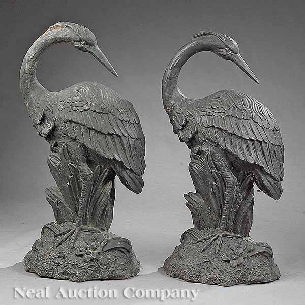 Appraisal: A Pair of Cast Iron Garden Cranes height in width