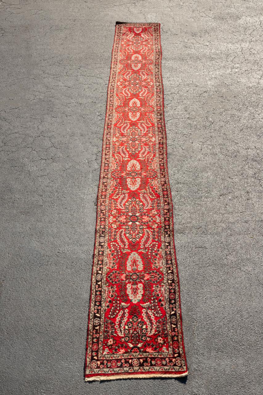 Appraisal: HAND KNOTTED WOOL SAROUK RUNNER X Hand knotted Persian Sarouk