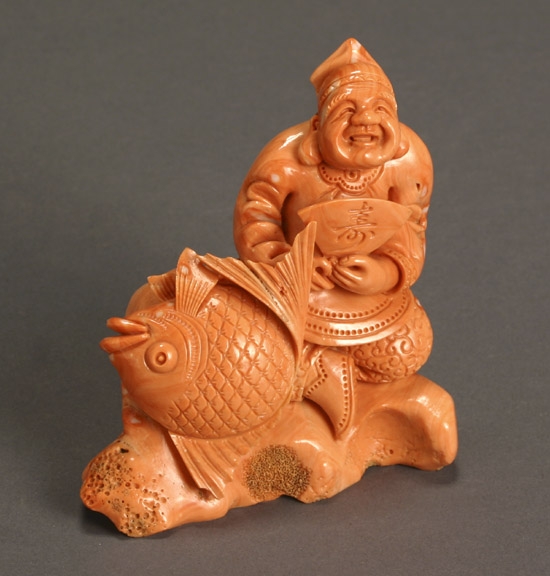 Appraisal: Japanese Orange Coral Okimono of Ebisu with Carp Meiji Period